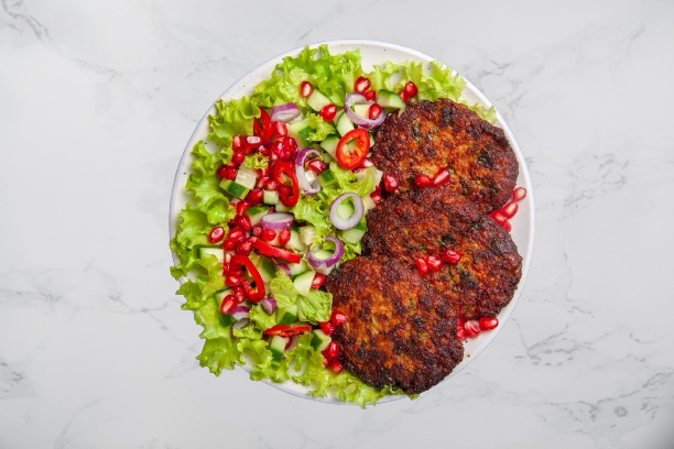 Meat cutlets with veg salad